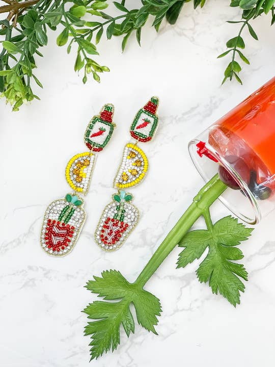 https://www.abigailfoxstore.com/cdn/shop/products/bloody-mary-beaded-dangle-earrings-950656_1600x.jpg?v=1683056226